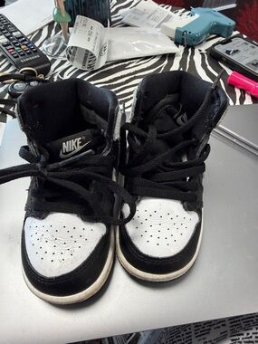 Nike Kids Black and White High-Top Sneakers with Lace-Up Closure